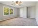 Bright bedroom with double windows and ceiling fan at 230 Wessex Ct, Atlanta, GA 30328