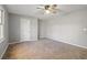 Spacious bedroom with ceiling fan and window at 230 Wessex Ct, Atlanta, GA 30328