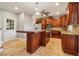 Eat-in kitchen with granite countertops, stainless steel appliances, and island at 230 Wessex Ct, Atlanta, GA 30328