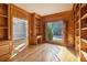 Study with wood paneling, built-in bookshelves, and a window seat at 230 Wessex Ct, Atlanta, GA 30328