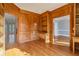 Bright library with wood paneling, built-in bookshelves, and natural light at 230 Wessex Ct, Atlanta, GA 30328