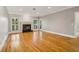 Bright living room with hardwood floors, fireplace and access to backyard at 230 Wessex Ct, Atlanta, GA 30328