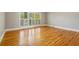 Spacious living room with hardwood floors and lots of natural light at 230 Wessex Ct, Atlanta, GA 30328