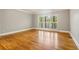 Living room with hardwood floors and large windows at 230 Wessex Ct, Atlanta, GA 30328