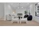 Light-filled living room with modern fireplace and hardwood floors at 4814 Moonview Ln, Sugar Hill, GA 30518