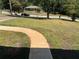 Landscaped yard with a curved walkway leading to the front door at 2323 Tilson Cir, Decatur, GA 30032