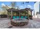 Cozy fire pit with seating area under a pergola at 3324 Peachtree Ne Rd # 1813, Atlanta, GA 30326