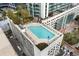 Aerial view of rooftop pool with surrounding lounge chairs at 3324 Peachtree Ne Rd # 1813, Atlanta, GA 30326