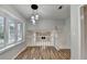 Dining area with hardwood floors and loft view at 3142 Falconhurst Dr, Lilburn, GA 30047