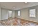 Bright living room with hardwood floors and neutral walls at 3142 Falconhurst Dr, Lilburn, GA 30047