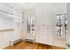 Bright walk-in closet with ample shelving and drawers at 3527 Preserve Se Dr, Atlanta, GA 30339