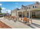 Relaxing poolside patio area with tables and umbrellas at 6109 Malloway Ct, Cumming, GA 30041