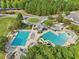 Large community pool complex with lap pool, leisure pool and waterslide at 6109 Malloway Ct, Cumming, GA 30041