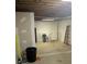 Unfinished basement with exposed beams and a door at 115 White Acres Dr, Stockbridge, GA 30281