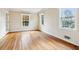 Bright living room with hardwood floors and neutral color palette at 1080 Tuxedo Dr, Roswell, GA 30075