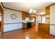 Kitchen with wood cabinets and granite countertops, open to dining area at 1450 Gateside Ct, Snellville, GA 30078