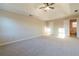 Spacious main bedroom with carpet and access to bathroom at 1450 Gateside Ct, Snellville, GA 30078