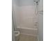 Clean bathroom with a shower/tub combo and light flooring at 2220 Arnold Mill Rd, Lawrenceville, GA 30044