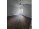 Spacious bedroom with grey carpet and ceiling fan at 2220 Arnold Mill Rd, Lawrenceville, GA 30044