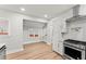 Bright kitchen with white shaker cabinets and stainless steel appliances at 2128 Hosea L Williams Ne Dr, Atlanta, GA 30317