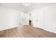 Spacious bedroom with light wood flooring and neutral walls at 3142 Chamblee Gap Rd, Cumming, GA 30040