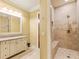 Spa-like bathroom with granite vanity and large walk-in shower at 1513 Jones Rd, Roswell, GA 30075