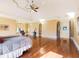 Spacious bedroom with hardwood floors and ensuite bathroom at 1513 Jones Rd, Roswell, GA 30075