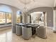 Spacious dining room with a dark wood table and a view to the entry at 1513 Jones Rd, Roswell, GA 30075