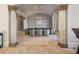 Elegant dining room featuring a large table, gray chairs, and a globe chandelier at 1513 Jones Rd, Roswell, GA 30075