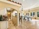Open concept game room with kitchen and ping pong table at 1513 Jones Rd, Roswell, GA 30075