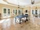 Game room with ping pong table and access to patio at 1513 Jones Rd, Roswell, GA 30075