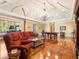 Relax in this game room, featuring a pool table and comfortable seating at 1513 Jones Rd, Roswell, GA 30075