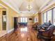 Game room with poker table, seating area, and hardwood floors at 1513 Jones Rd, Roswell, GA 30075