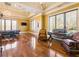 Game room boasts a poker table, comfortable chairs, and hardwood floors at 1513 Jones Rd, Roswell, GA 30075