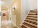 Elegant hallway with arched entryways and tiled flooring at 1513 Jones Rd, Roswell, GA 30075