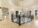 Long hallway with ornate railing, hardwood floors and artwork at 1513 Jones Rd, Roswell, GA 30075