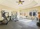 Well-equipped home gym with various exercise machines and a mirrored wall at 1513 Jones Rd, Roswell, GA 30075