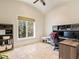 Bright home office with built-in desk and large window at 1513 Jones Rd, Roswell, GA 30075