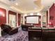 Home theater with recessed lighting and comfortable seating at 1513 Jones Rd, Roswell, GA 30075