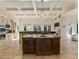 Luxury kitchen with large island, granite counters, and stainless steel appliances at 1513 Jones Rd, Roswell, GA 30075