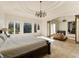 Spacious main bedroom with sitting area and stunning views at 1513 Jones Rd, Roswell, GA 30075