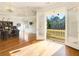 Spacious home office with hardwood floors and a private balcony at 1513 Jones Rd, Roswell, GA 30075