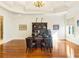 Spacious home office with hardwood floors, large desk and chairs at 1513 Jones Rd, Roswell, GA 30075