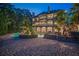 Inviting pool area with a stone patio and lush landscaping at 1513 Jones Rd, Roswell, GA 30075