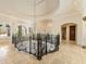 Open upper hallway overlooking the entryway and staircase at 1513 Jones Rd, Roswell, GA 30075