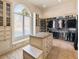 Large walk-in closet with ample shelving and hanging space at 1513 Jones Rd, Roswell, GA 30075