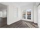 Bright sunroom with white brick and hardwood floors at 2044 Fairhaven Cir, Atlanta, GA 30305