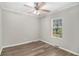 Bright bedroom with ceiling fan and window with blinds at 3162 Alston Dr, Decatur, GA 30032