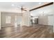 Open concept living and kitchen area with wood-look floors at 3162 Alston Dr, Decatur, GA 30032