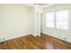 Bright bedroom with hardwood floors and ceiling fan at 921 Byron Sw Dr, Atlanta, GA 30310